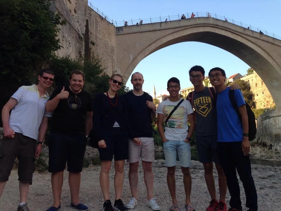 Group of travellers at the Old Bridge in Mostar
