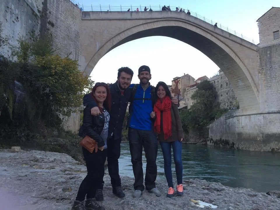 Tourists learning about Mostar's culture with local guide